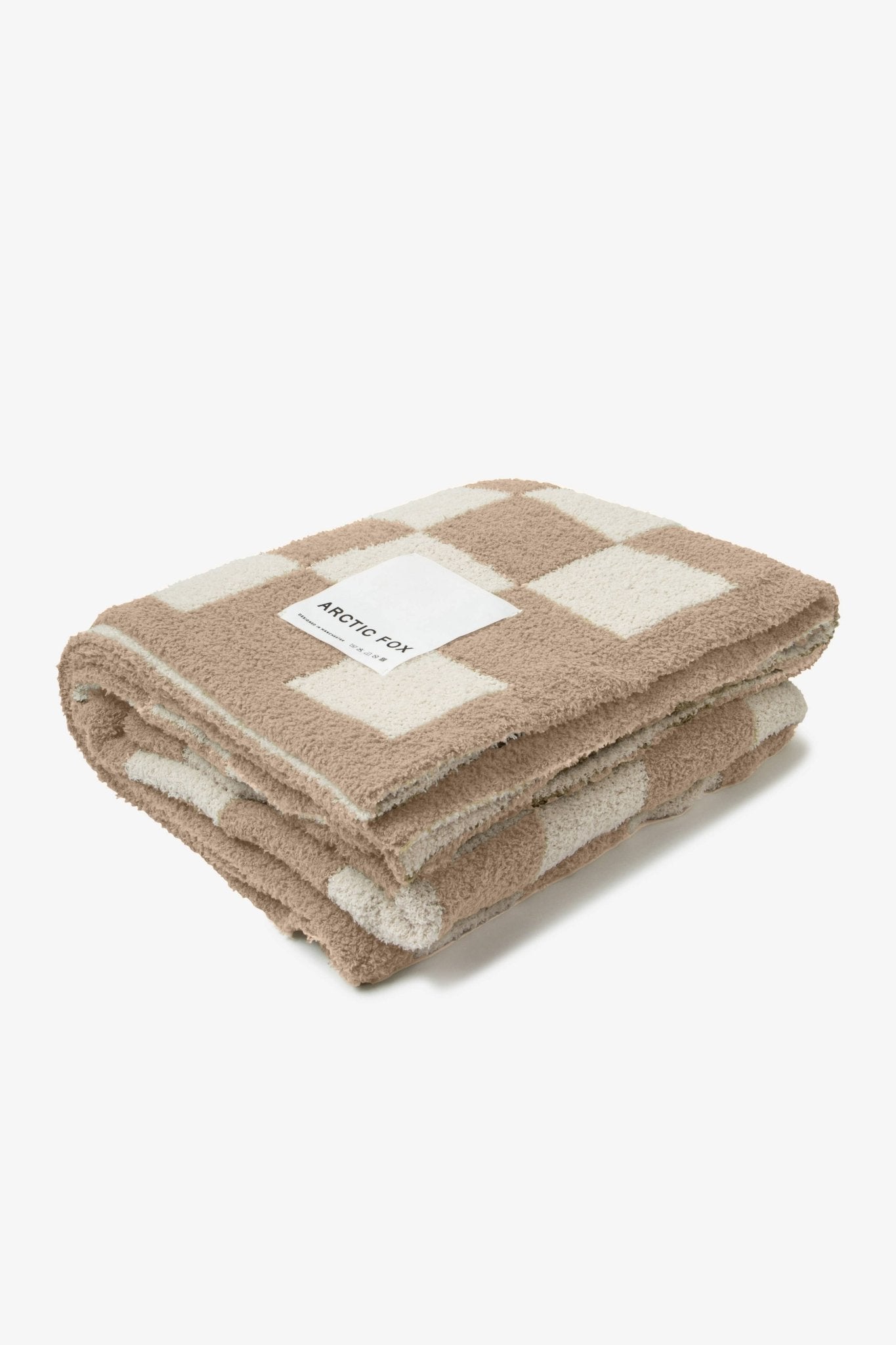 folded cheque blanket on a white background